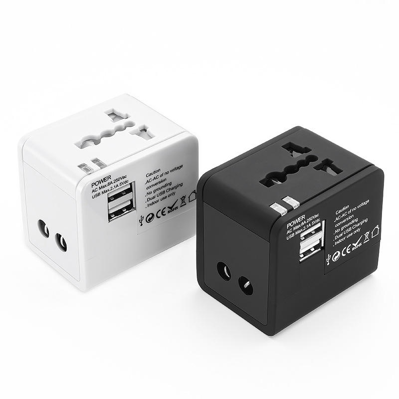 Universal rejseadapter med dobbelte USB-porte